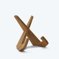 Bild in Galerie-Betrachter laden, Buchständer in X-Form aus naturfarbener Eiche, minimalistisches Design mit geschwungenen Haken-Enden, Ansicht seitlich